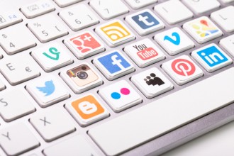 Trademark applicant’s Twitter account not service mark use for social media services | IP Law Firm | Harness IP shutterstock social media keyboard | Intellectual Property Law Firm | Harness IP