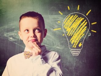 shutterstock 274737008 kid with lightbulb small v2 | Intellectual Property Law Firm | Harness IP
