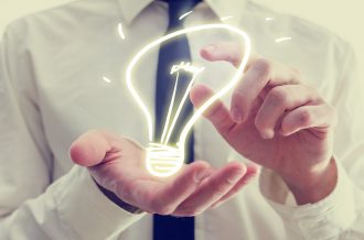 shutterstock lightbulb hands | Intellectual Property Law Firm | Harness IP