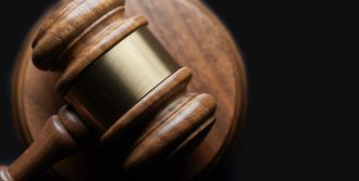 patent law litigation gavel | Intellectual Property Law Firm | Harness IP