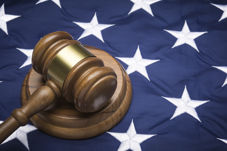 Gavel on American flag, close up