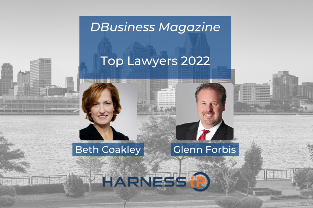 Headshots of Metro Detroit Top Lawyers Beth Coakley and Glenn Forbis against backdrop of downtown Detroit